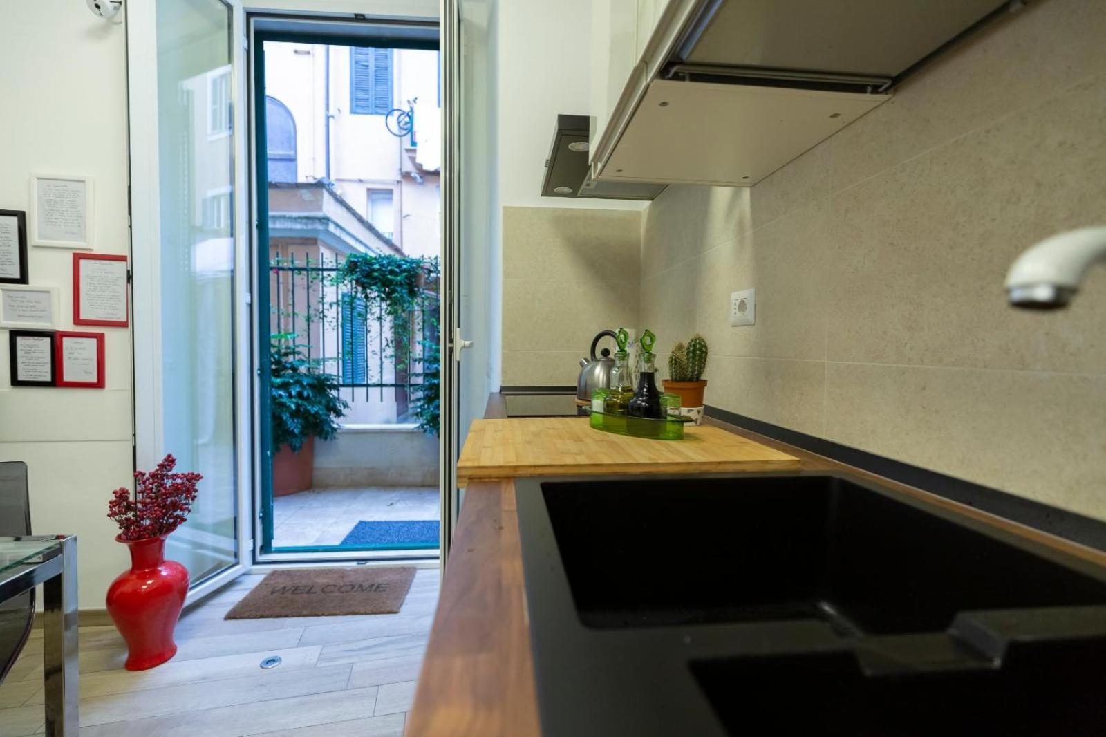 Flatinrome Trastevere Deluxe Rooms - Green Patio Eksteriør billede